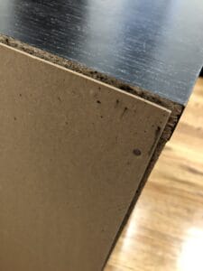 bed bug fecal staining on wood - signs of bed bugs in an empty house